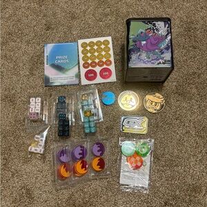 Various Pokemon Dice, Coins, and Tin
